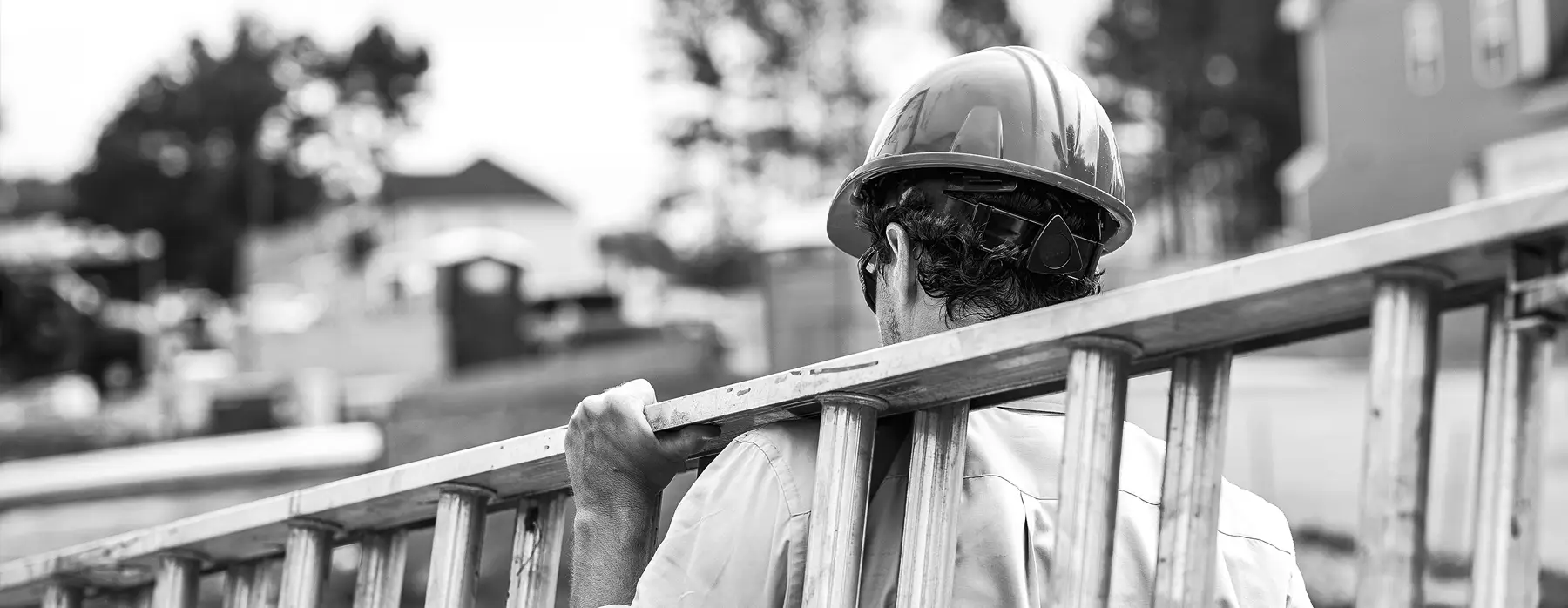 Man carrying a ladder